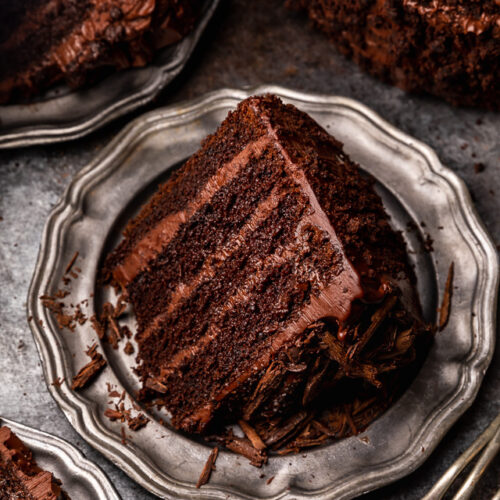 If you love chocolate cake, you have to try this sinfully delicious recipe for Devil's Food Cake! It's an old-fashioned recipe that's intensely rich, moist yet dense, and totally decadent! Exploding with rich chocolate flavor and covered in chocolate frosting, it's sure to become your favorite chocolate cake recipe!